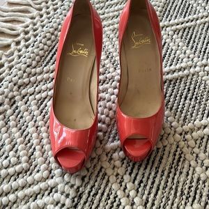 Christian Louboutin patent leather peep toe heels, size 38 1/2. Barbie color!